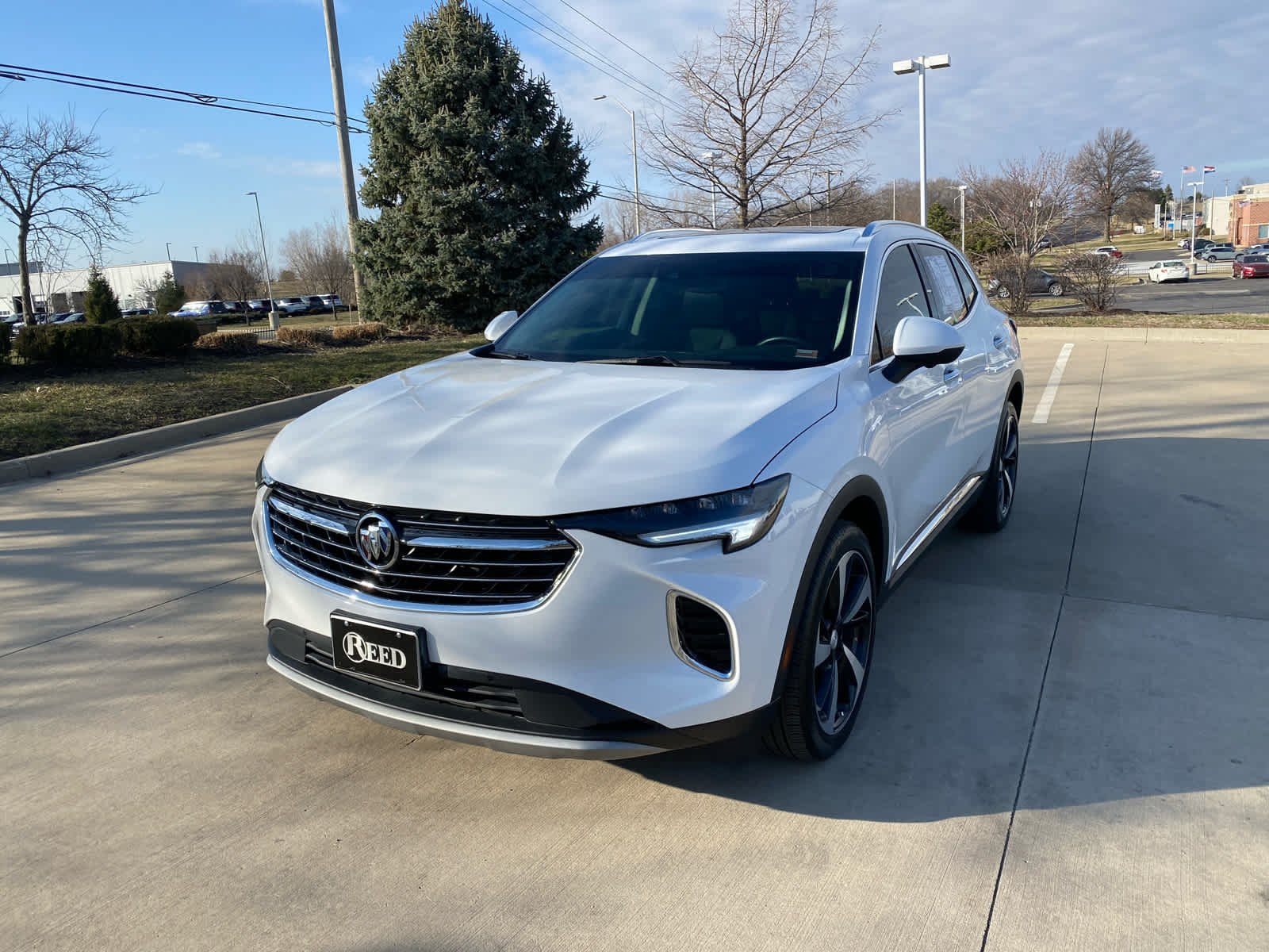 Used 2021 Buick Envision Essence with VIN LRBFZPR43MD137252 for sale in Kansas City