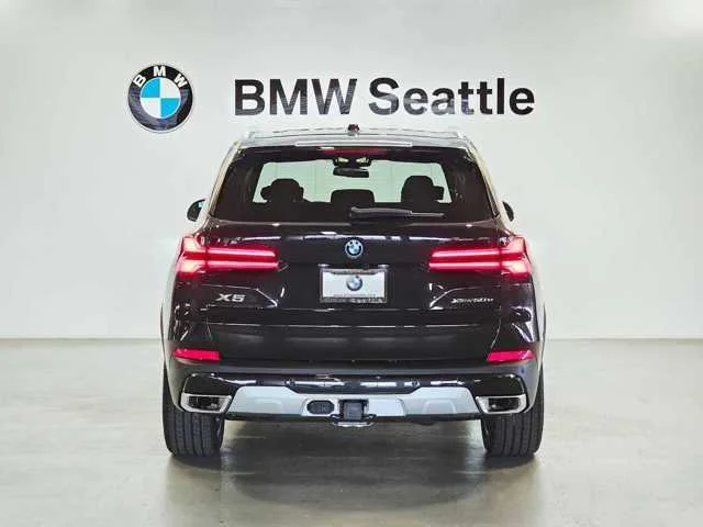 Used 2025 Black Sapphire Metallic BMW xDrive50e image 5
