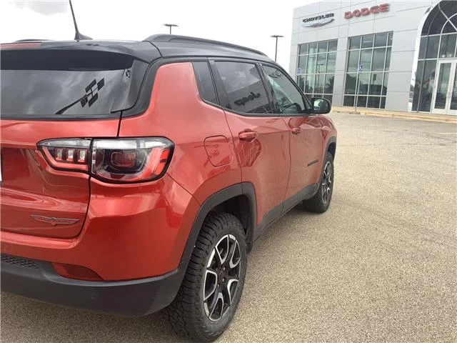 Used 2025 Red Hot Pearlcoat Jeep Trailhawk 4x4 image 8