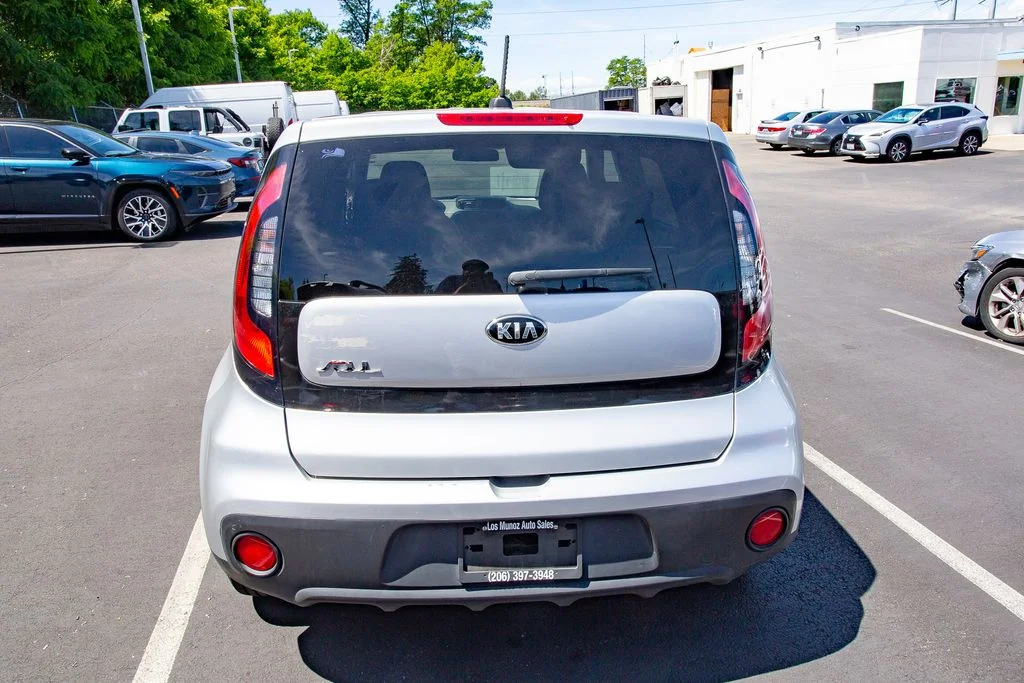 Used 2017 Bright Silver Kia Base image 4