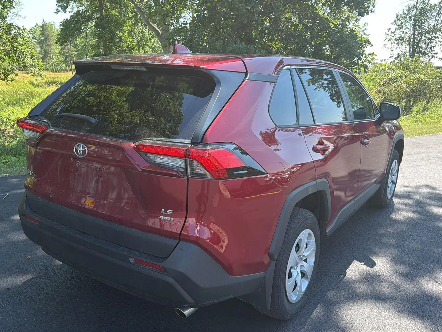 Used 2023 Ruby Flare Pearl Toyota LE image 6