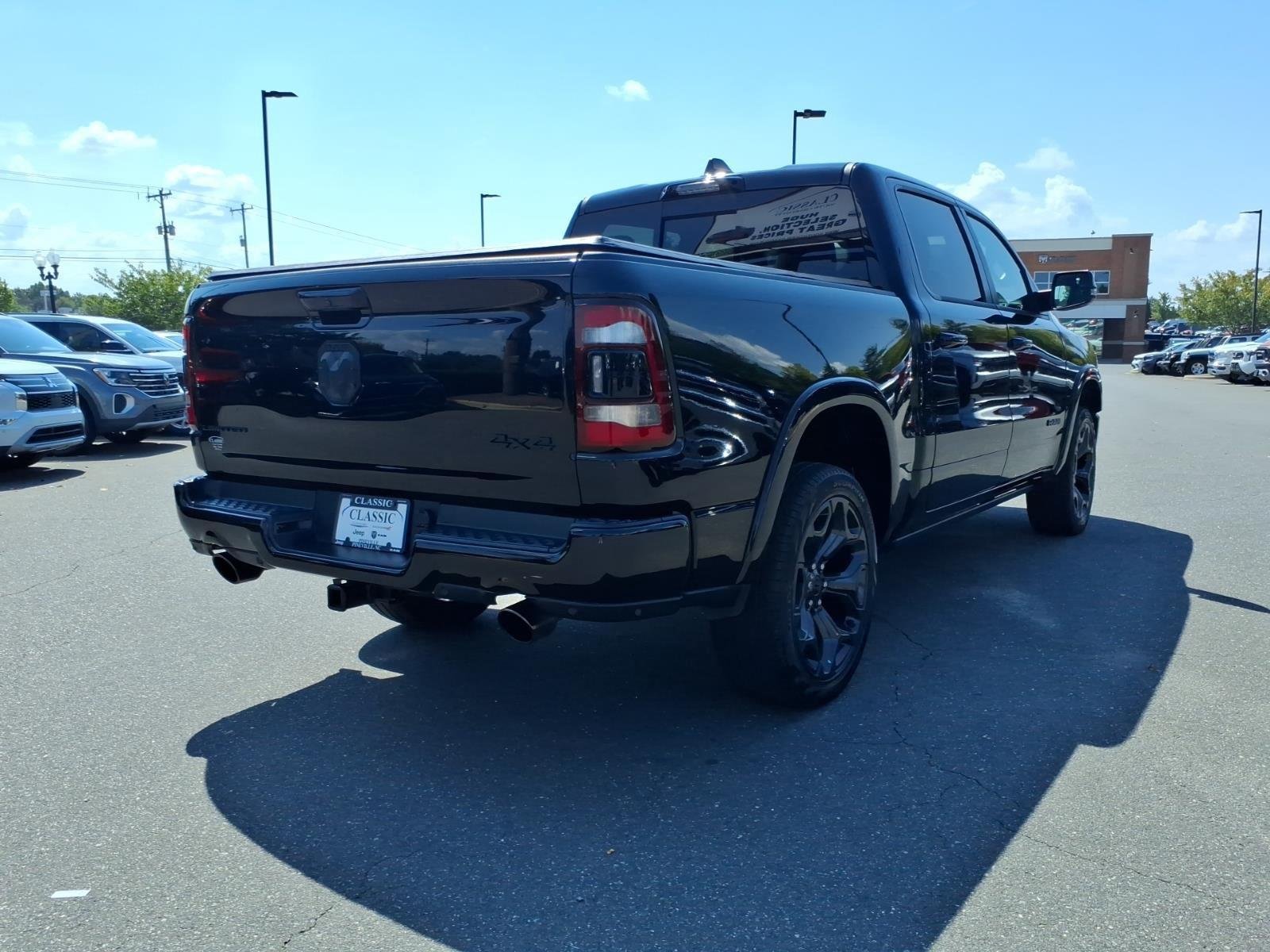 Used 2023 Diamond Black Crystal Pearlcoat Ram Limited image 2