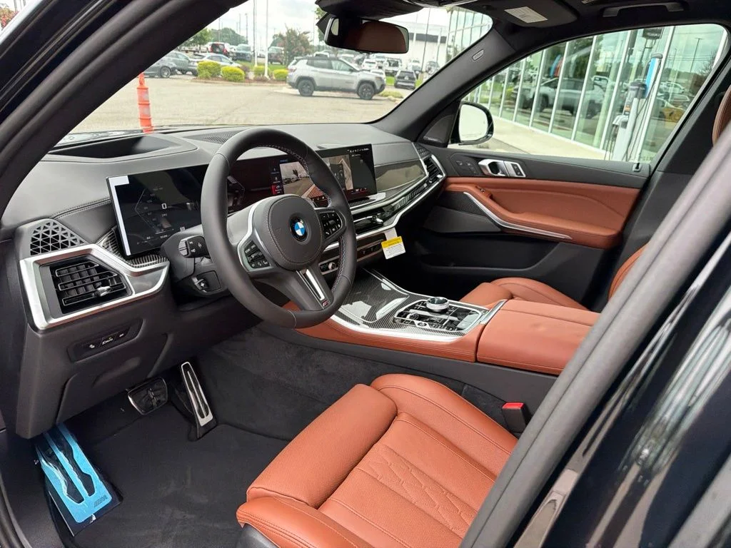 New 2026 Black Sapphire Metallic BMW M60i image 16