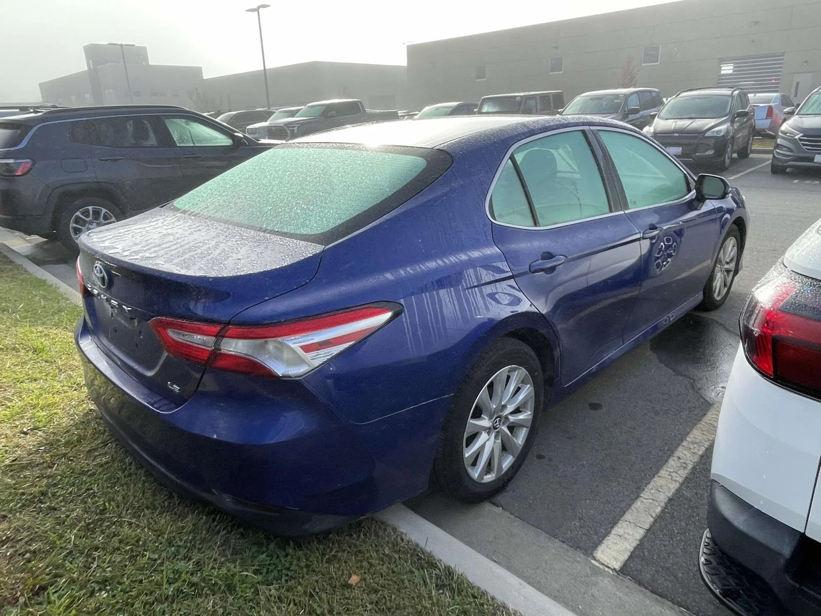 Used 2018 Blue Crush Metallic Toyota LE image 4
