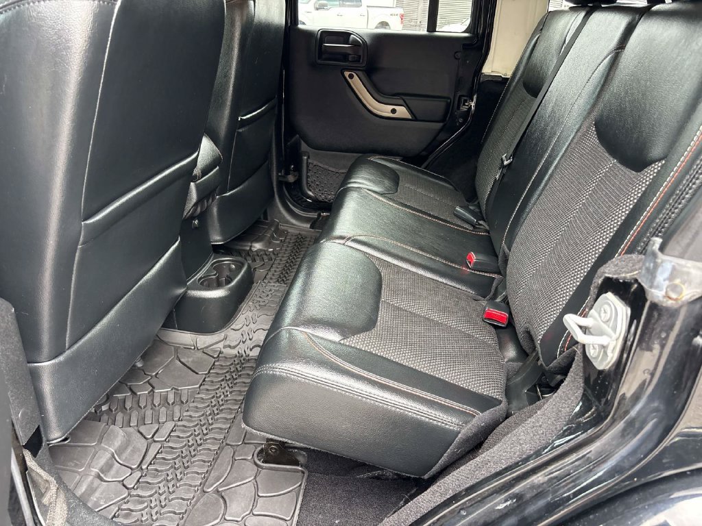 Used 2016 Black Jeep Unlimited Sahara image 10