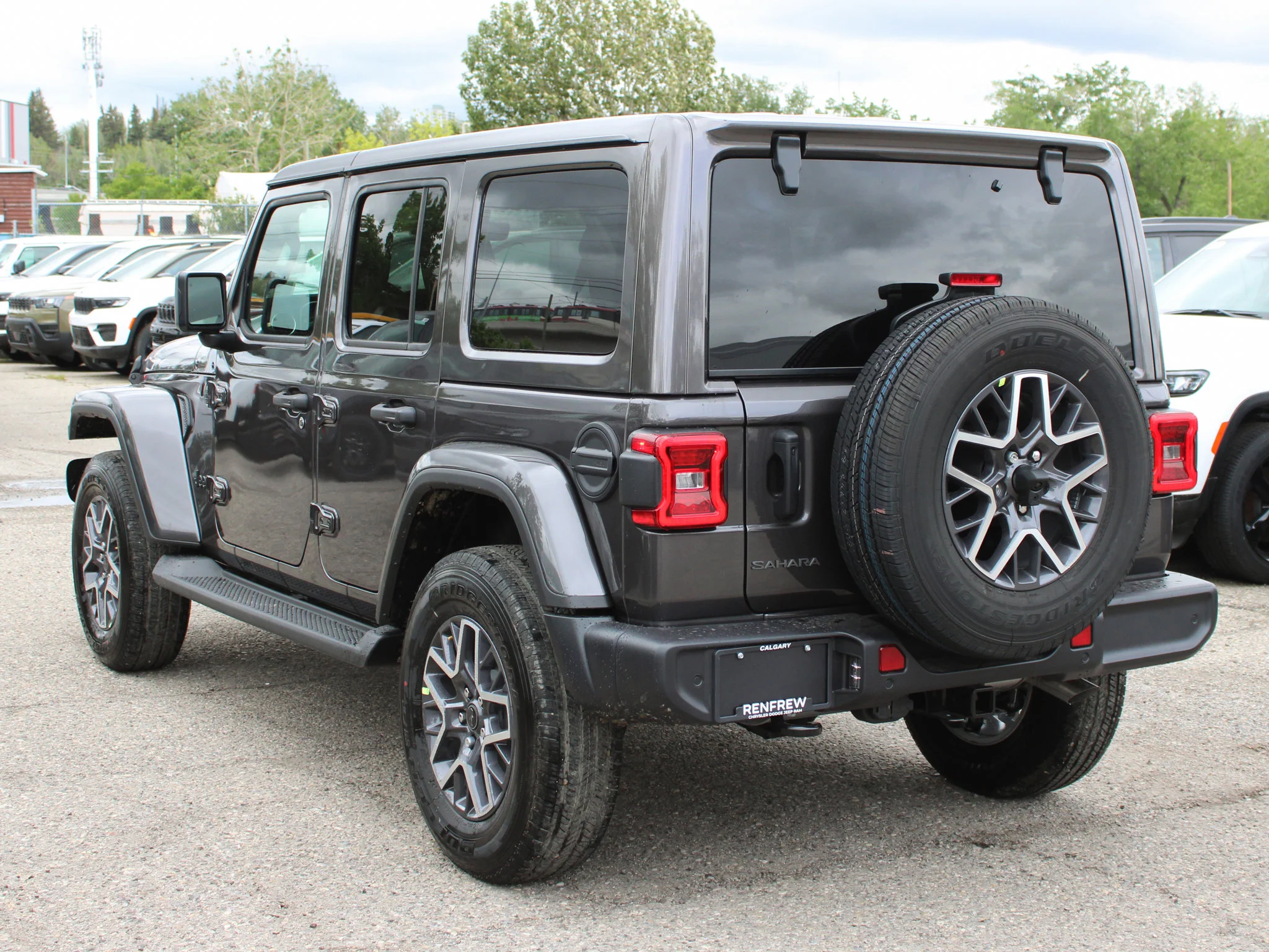 New 2026 Grey Jeep Sahara* image 3