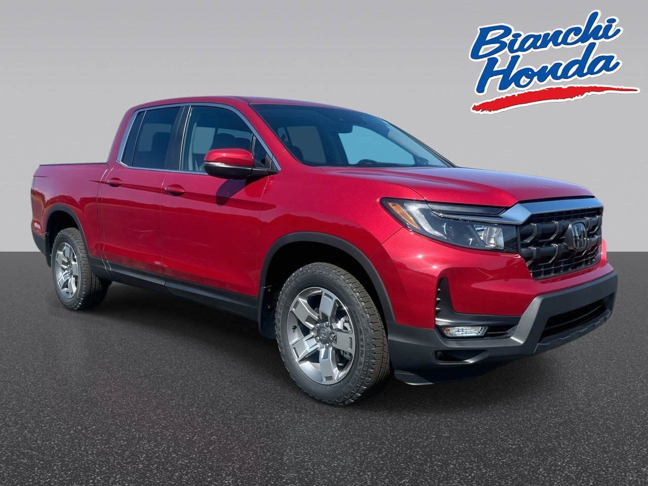 New 2026 Radiant Red Metallic II Honda RTL AWD image 1