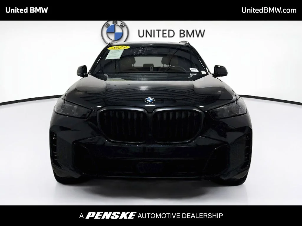 Used 2024 Black Sapphire Metallic BMW sDrive40i image 2