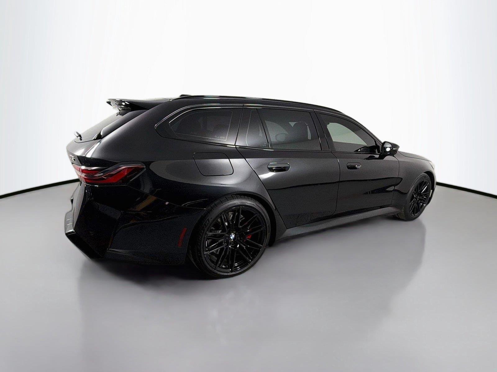 New 2027 Black Sapphire Metallic BMW Touring image 4