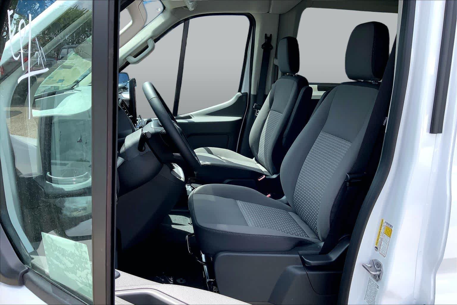 New 2026 Oxford White Ford Passenger Van XLT image 8