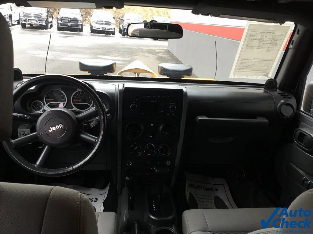 Used 2010 Black Jeep Unlimited Sport image 20