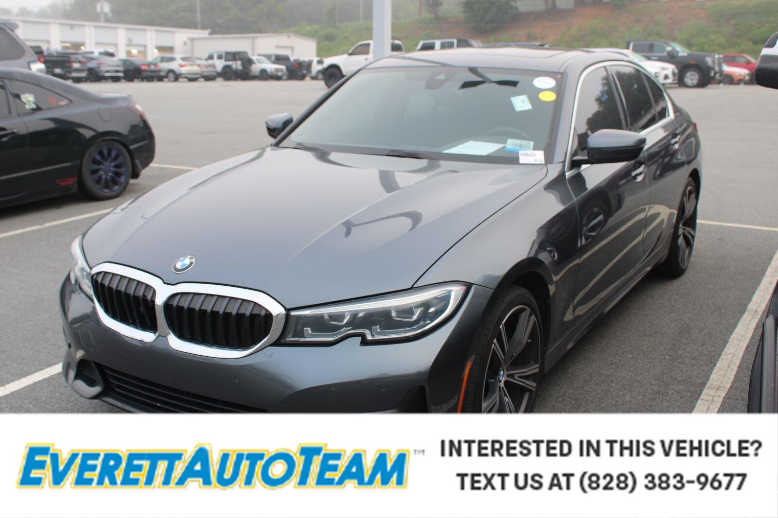 Used 2021 Mineral Gray Metallic BMW 330i xDrive image 1