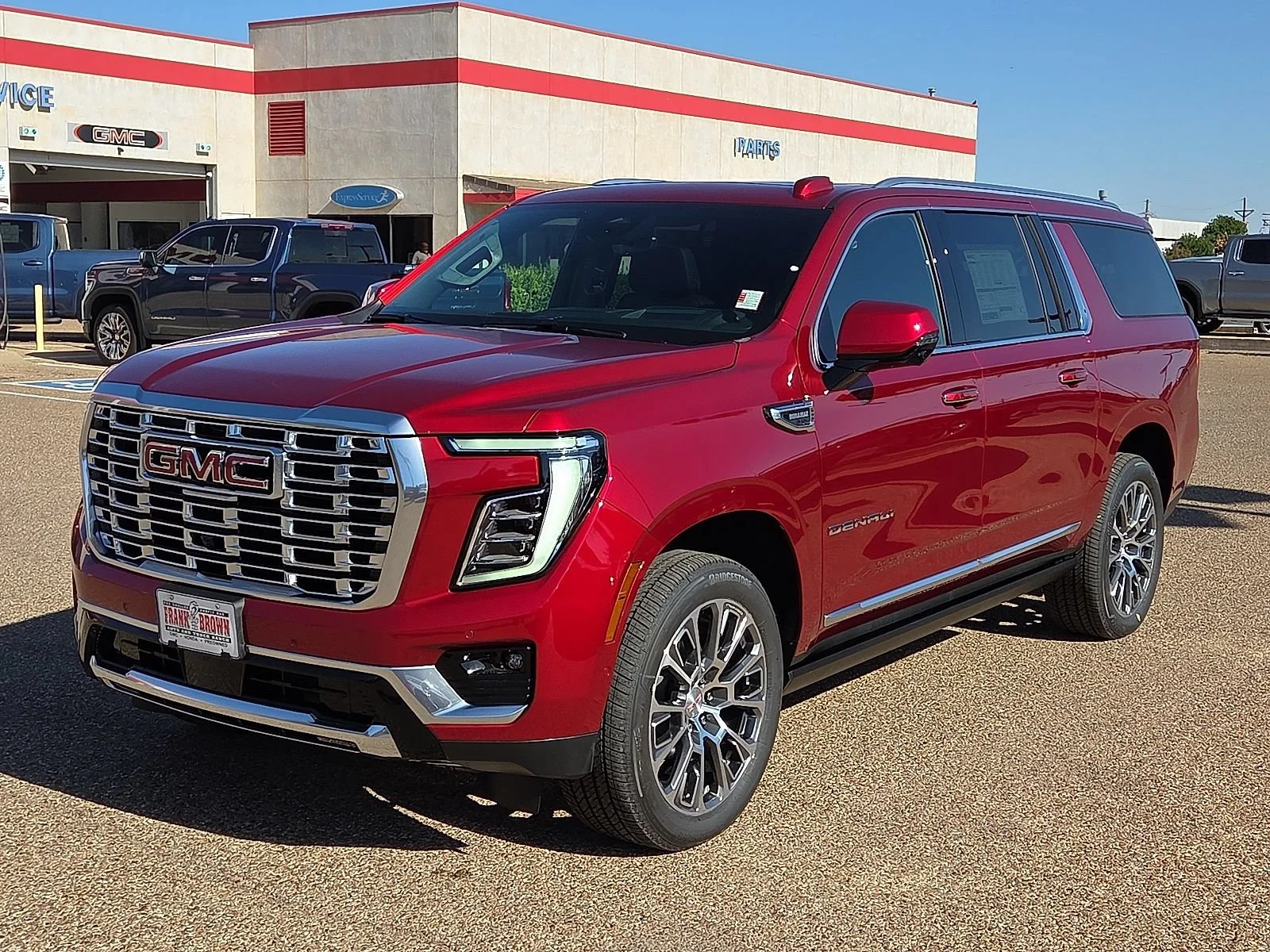 New 2026 Volcanic Red Tintcoat GMC Denali image 1