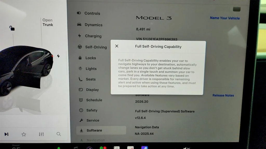 Used 2023 Solid Black Tesla RWD image 20