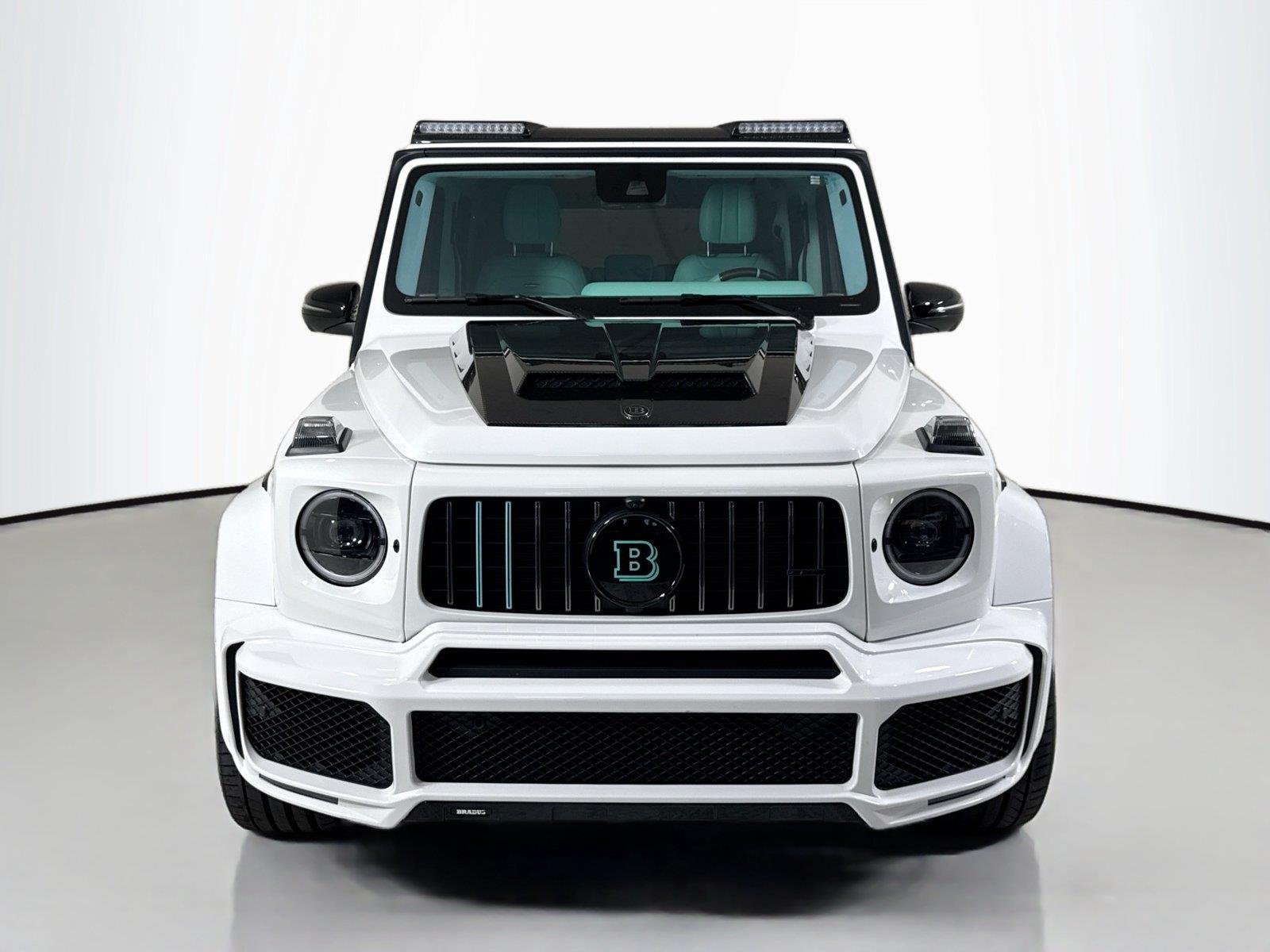 Used 2024 Polar White Mercedes-Benz AMG® G 63  Brabus Custom Widebody / Custom Tiffany Interior image 11