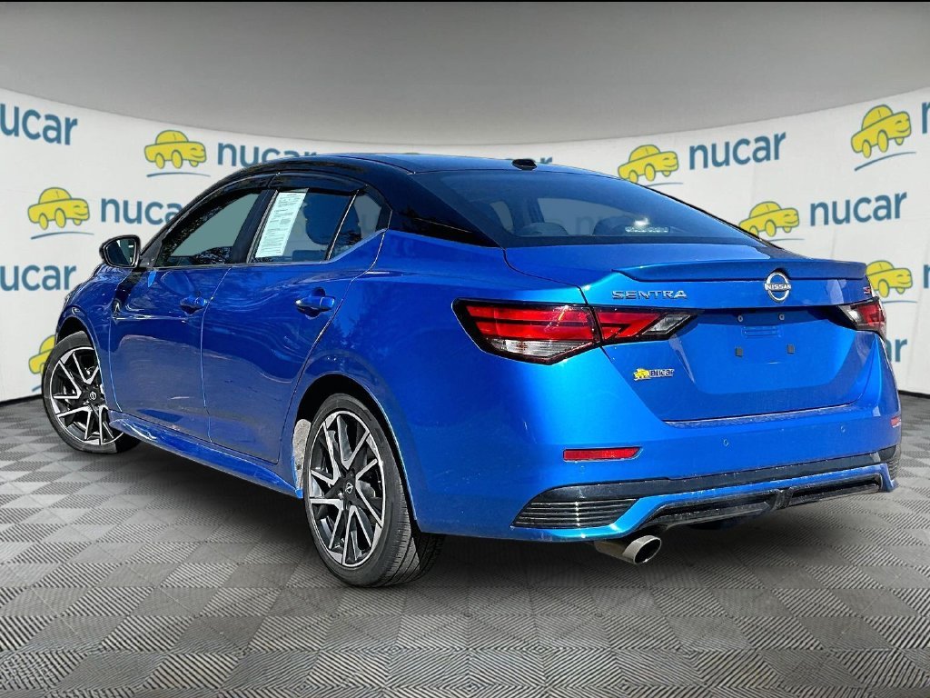 Used 2025 Electric Blue Metallic/Super Black Nissan SR image 4