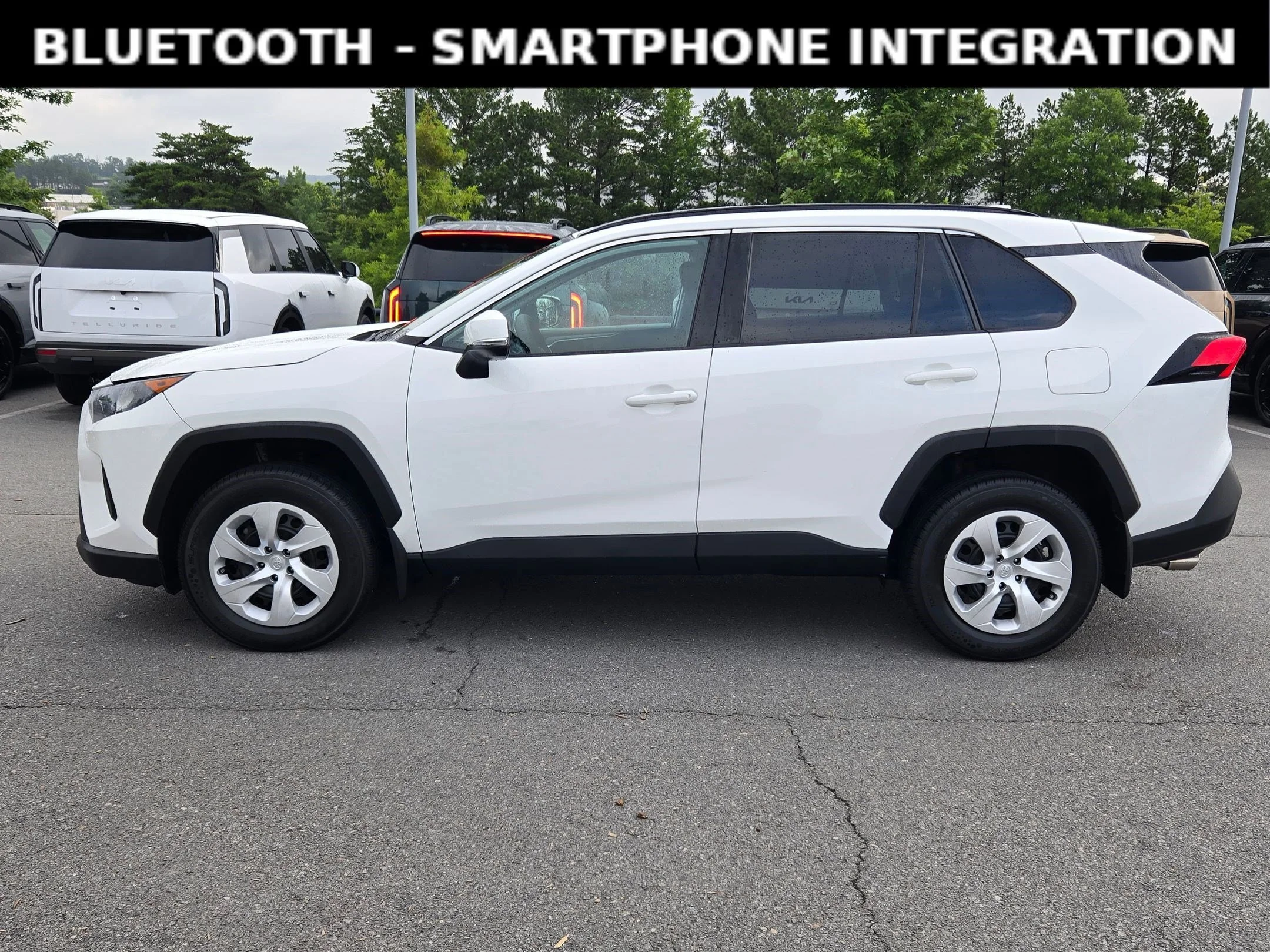 Used 2021 Super White Toyota LE image 4