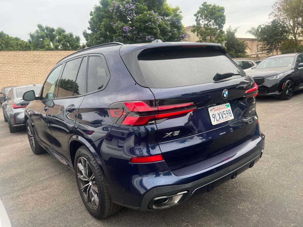 Used 2024 Tanzanite Blue II Metallic BMW sDrive40i image 7
