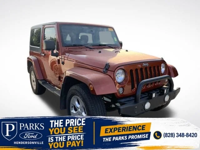 Used 2014 Copperhead Pearlcoat Jeep Sahara image 1