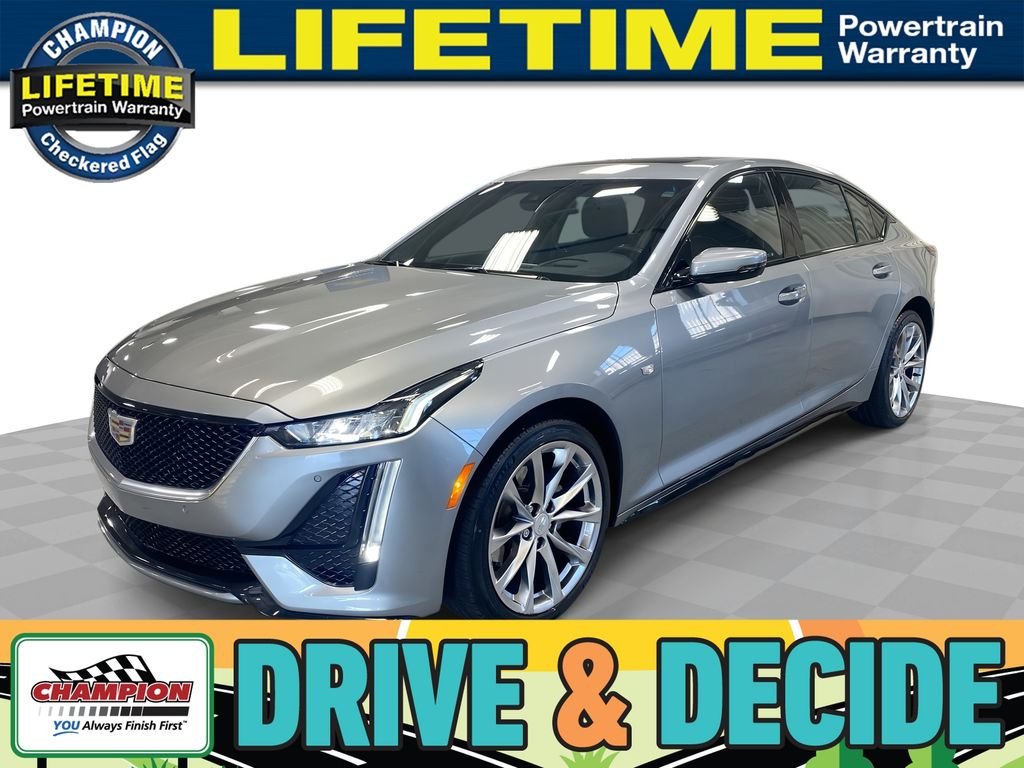 Used 2023 Silver Metallic Cadillac Sport image 1