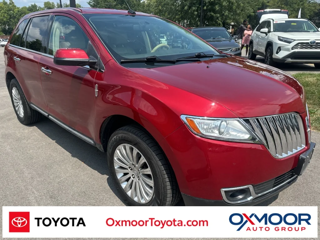 Used 2014 Ruby Red Metallic Tinted Clearcoat Lincoln Base image 1