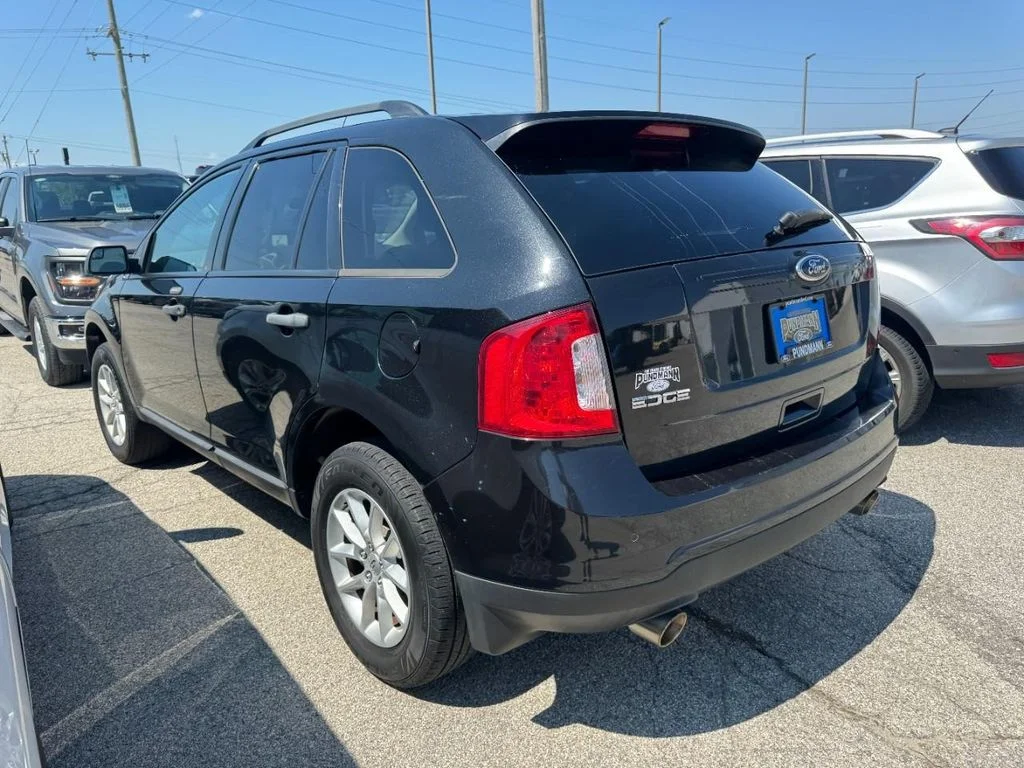 Used 2013 Tuxedo Black Metallic Ford SE image 5