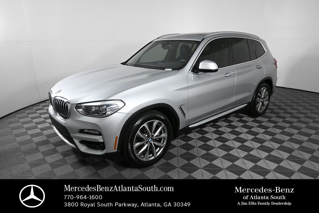 Used 2019 Silver BMW sDrive30i image 1