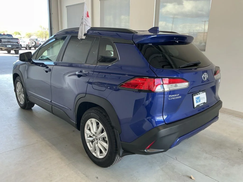 Used 2023 Blue Crush Metallic Toyota LE image 4