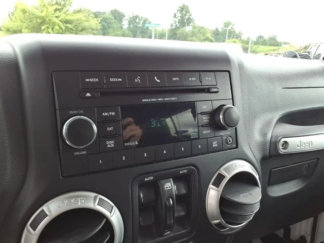 Used 2015 White Jeep Unlimited Sport image 25