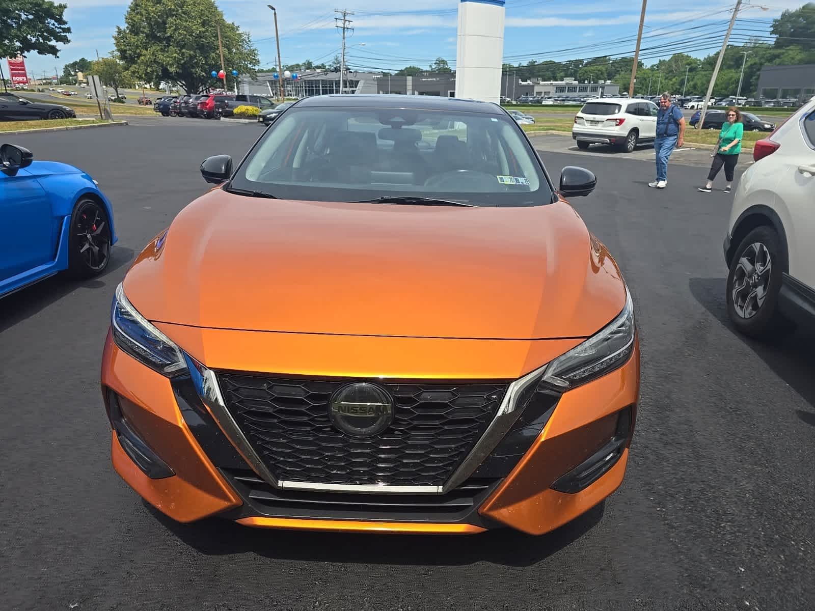 Used 2023 Monarch Orange Metallic/Super Black Nissan SR image 2