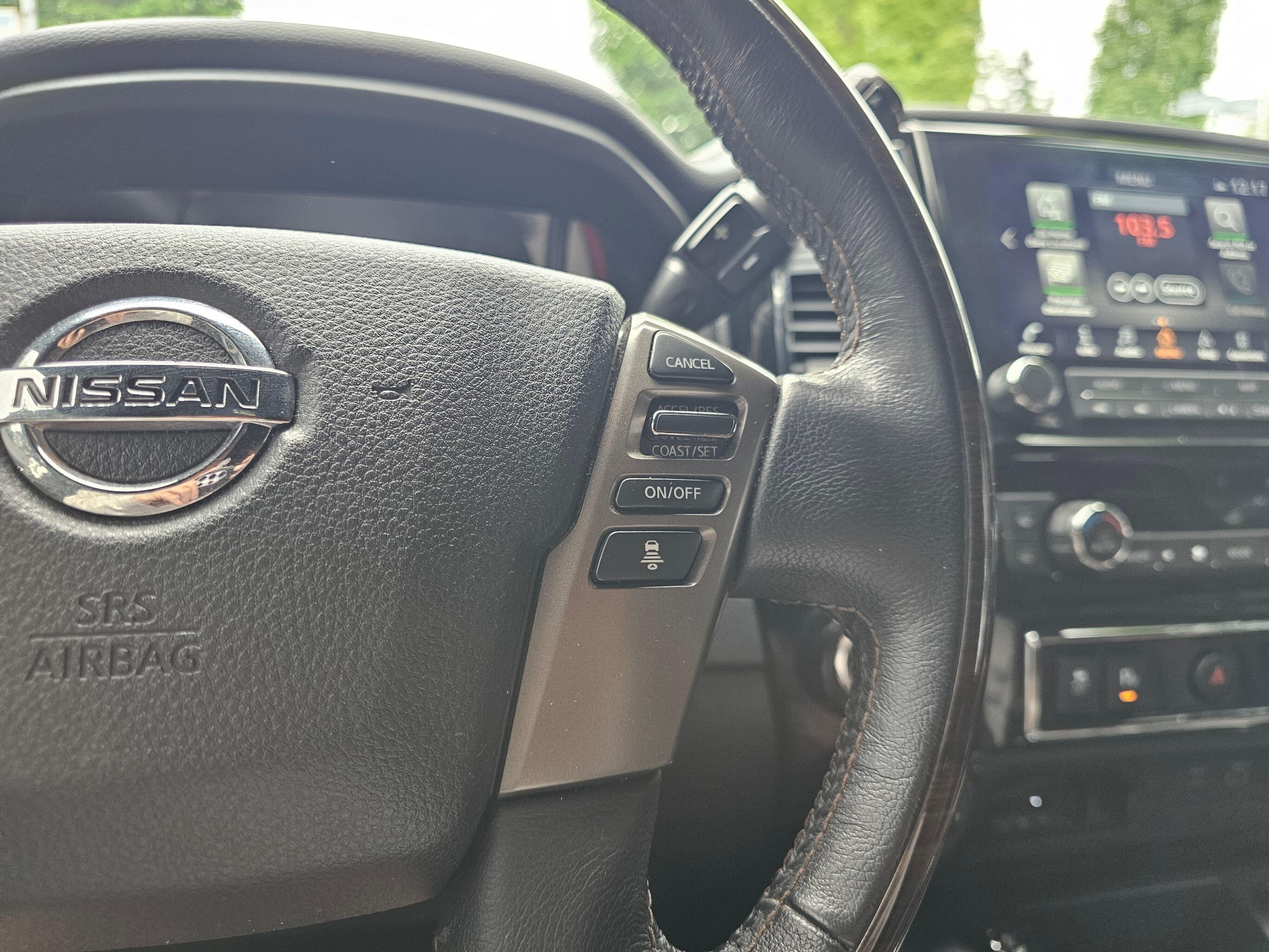 Used 2021 Super Black Nissan Platinum Reserve image 33