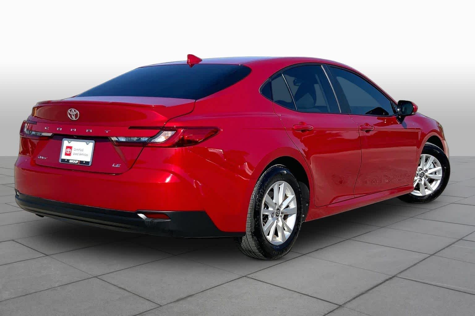 Used 2025 Supersonic Red Toyota LE image 13