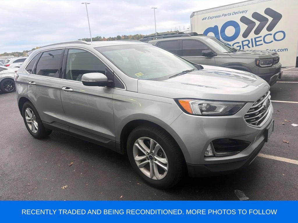 Used 2020 Silver Metallic Ford SEL image 1
