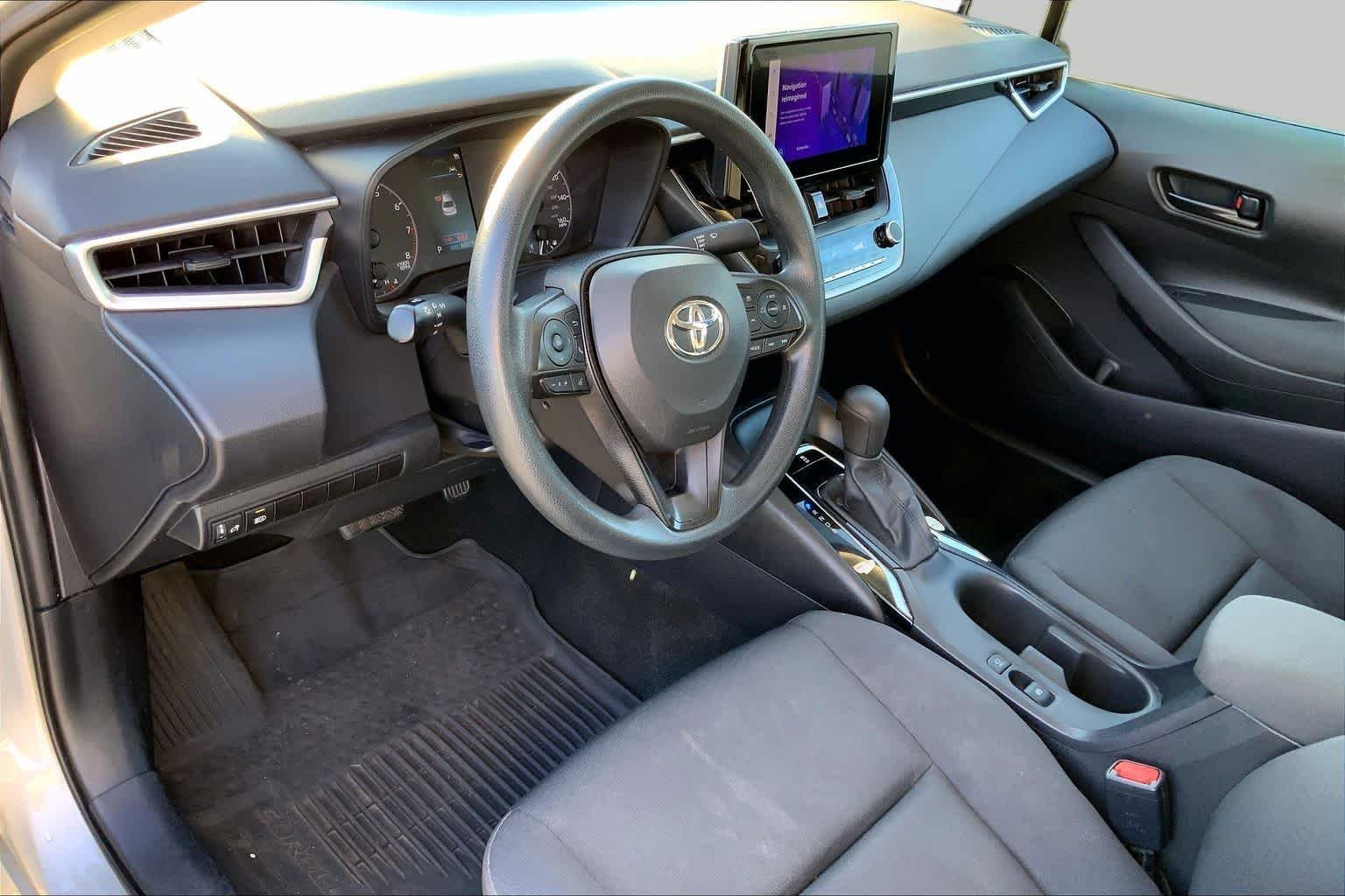 Used 2024 Classic Silver Metallic Toyota LE image 16