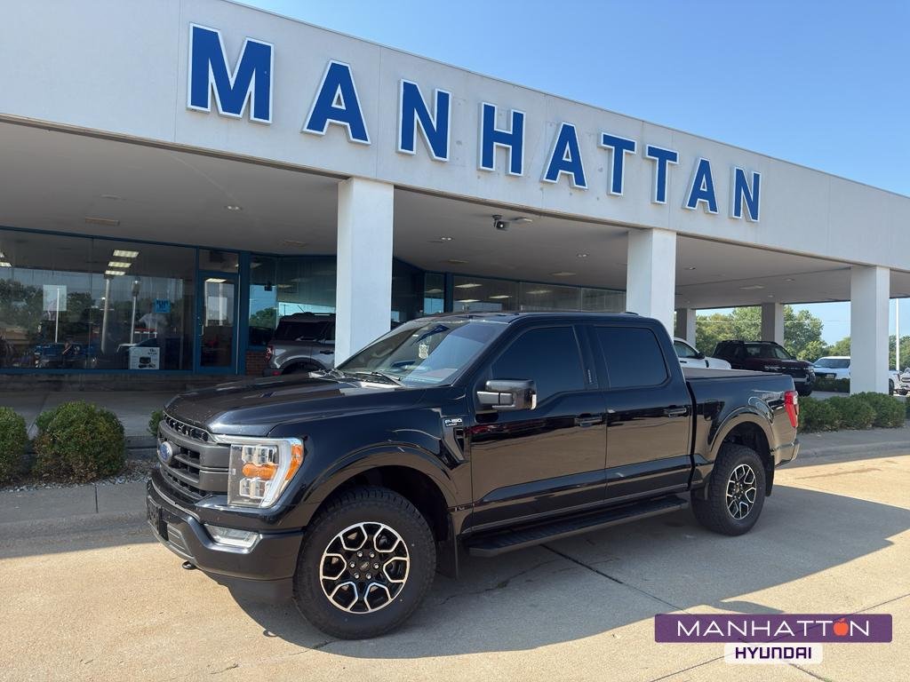 Used 2023 Agate Black Metallic Ford LARIAT image 1