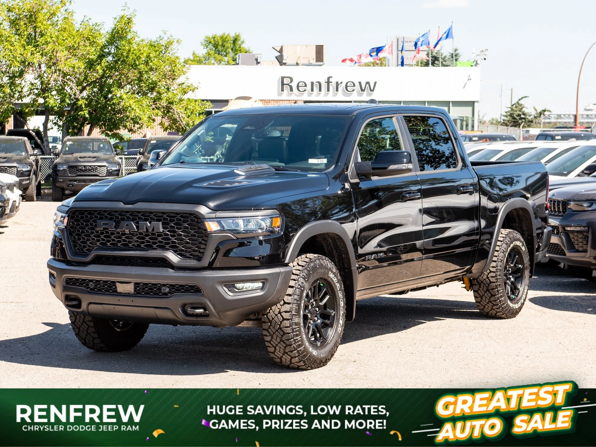 New 2026 Black RAM Rebel* Crew Cab 4x4, 33 Inch A/T Tires, Pano Sunroof, Passenger Screen image 1