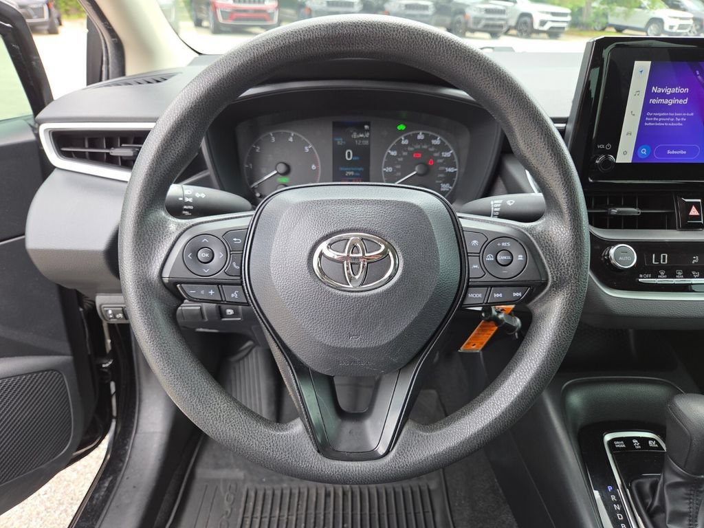 Used 2023 Midnight Black Metallic Toyota Hybrid LE image 31