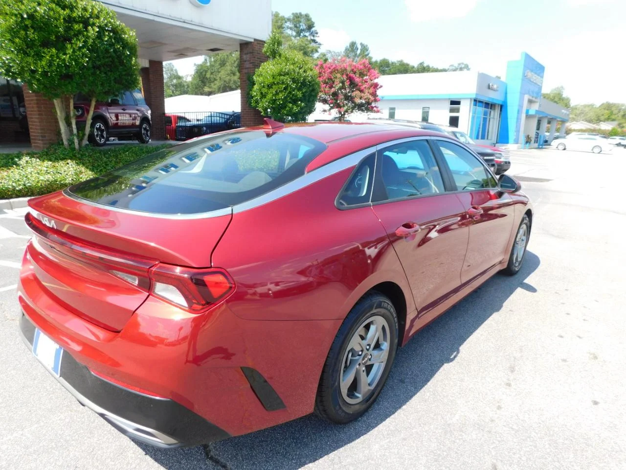 Used 2023 Burgundy Kia LXS AUTO FWD image 8