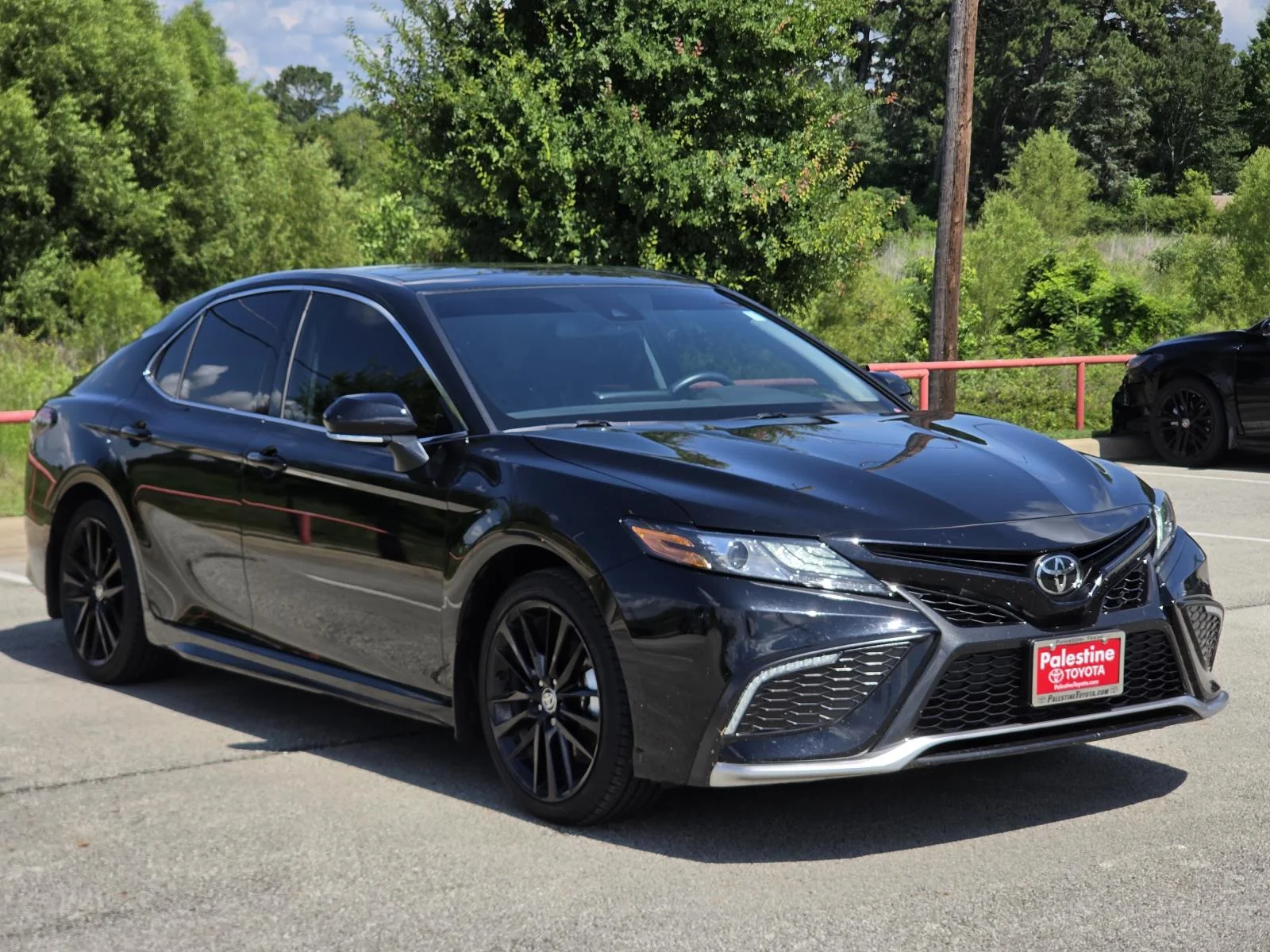 Used 2023 Midnight Black Metallic Toyota XSE Auto (Natl) image 1