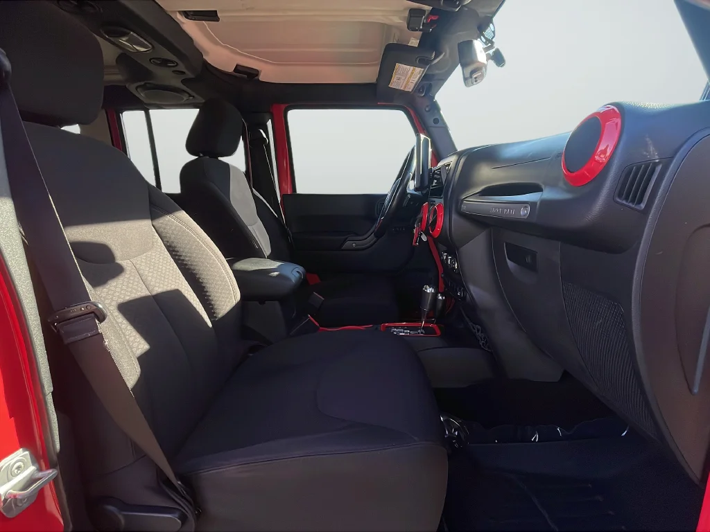Used 2013 Red Jeep Unlimited Sport image 26