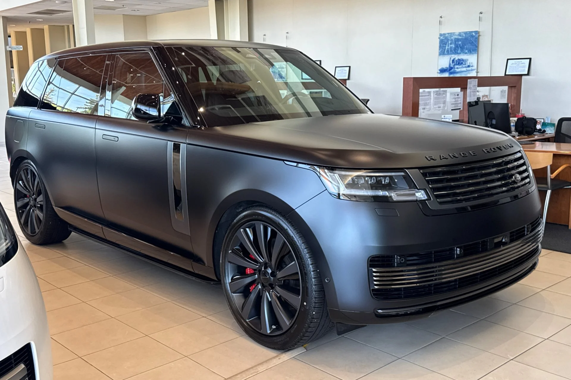 New 2026 Obsidian Black Satin Land Rover SV image 9
