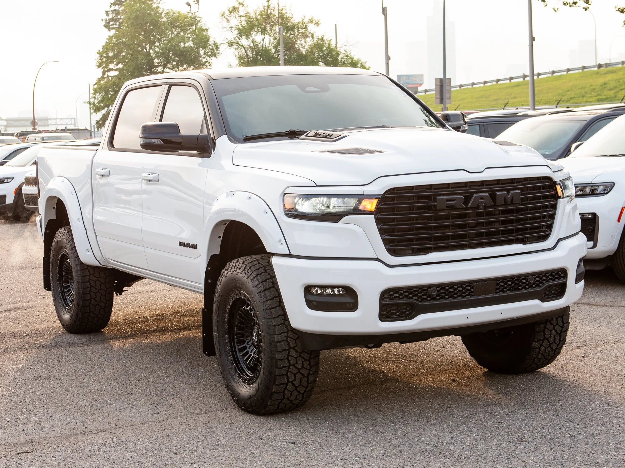 New 2026 White RAM Sport*, 6 Inch Lift, 37 Inch Tires, Trigger Industries Mudflaps image 10