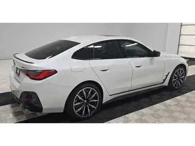 Certified Used 2023 Mineral White Metallic BMW eDrive40 image 2