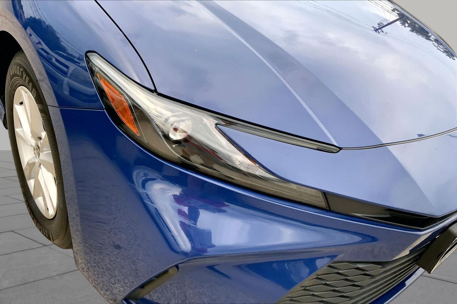 Used 2025 Reservoir Blue Toyota LE image 27