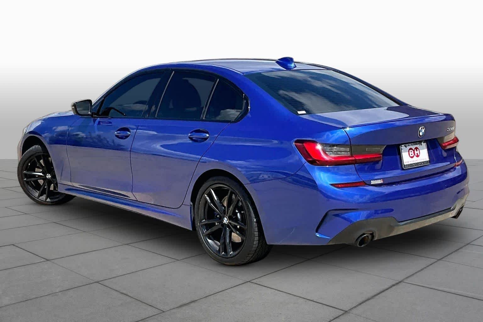Used 2022 Portimao Blue Metallic BMW 330i xDrive image 12