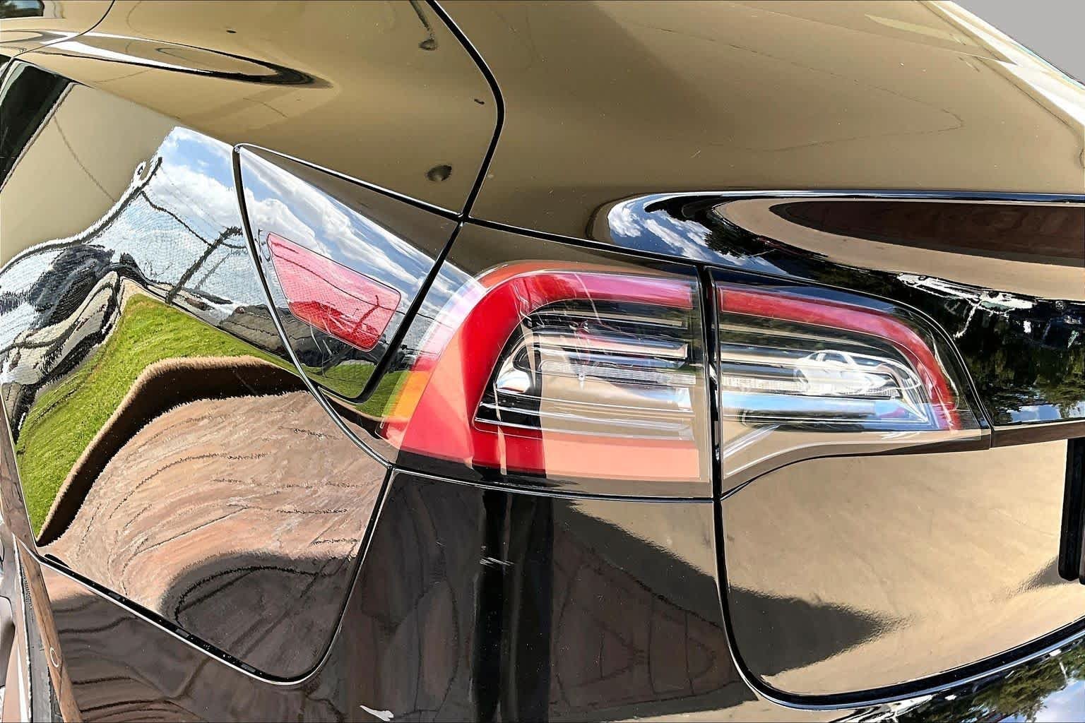 Used 2021 Solid Black Tesla Standard Range Plus image 25