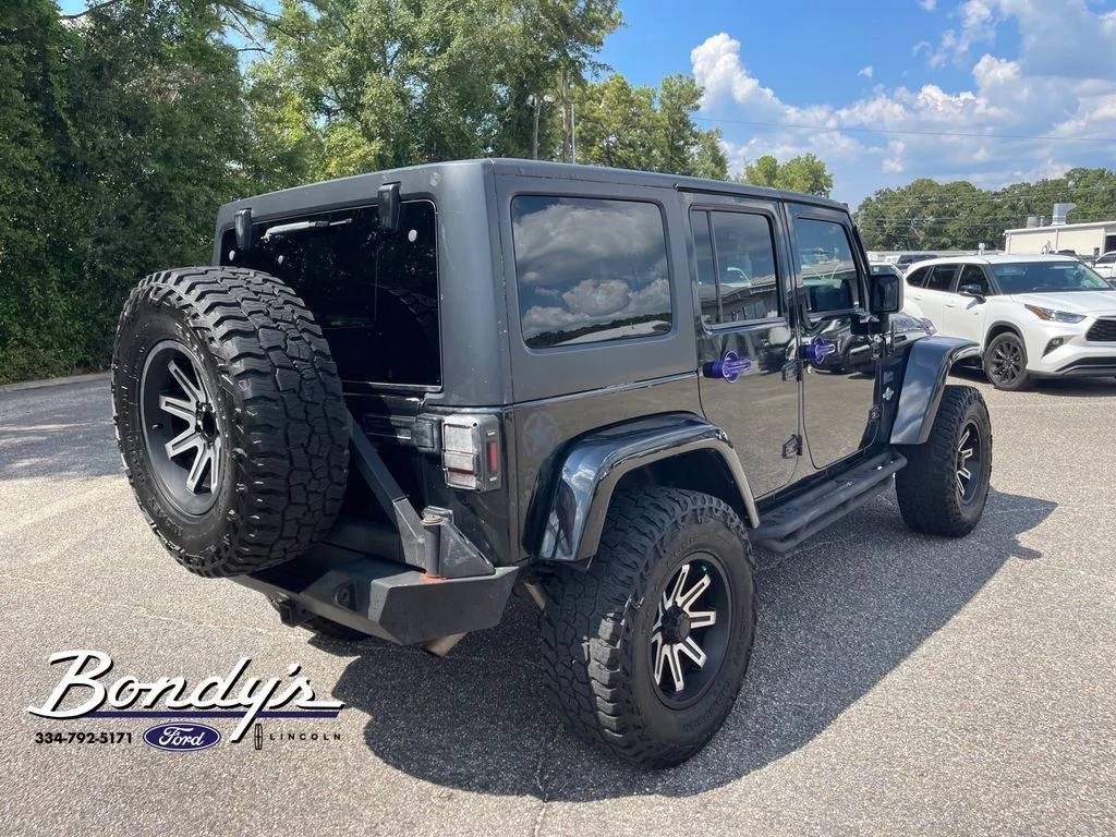 Used 2013 Black Clearcoat Jeep Unlimited Sport image 15