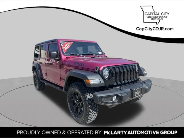 Used 2021 Red Jeep Unlimited Willys image 1