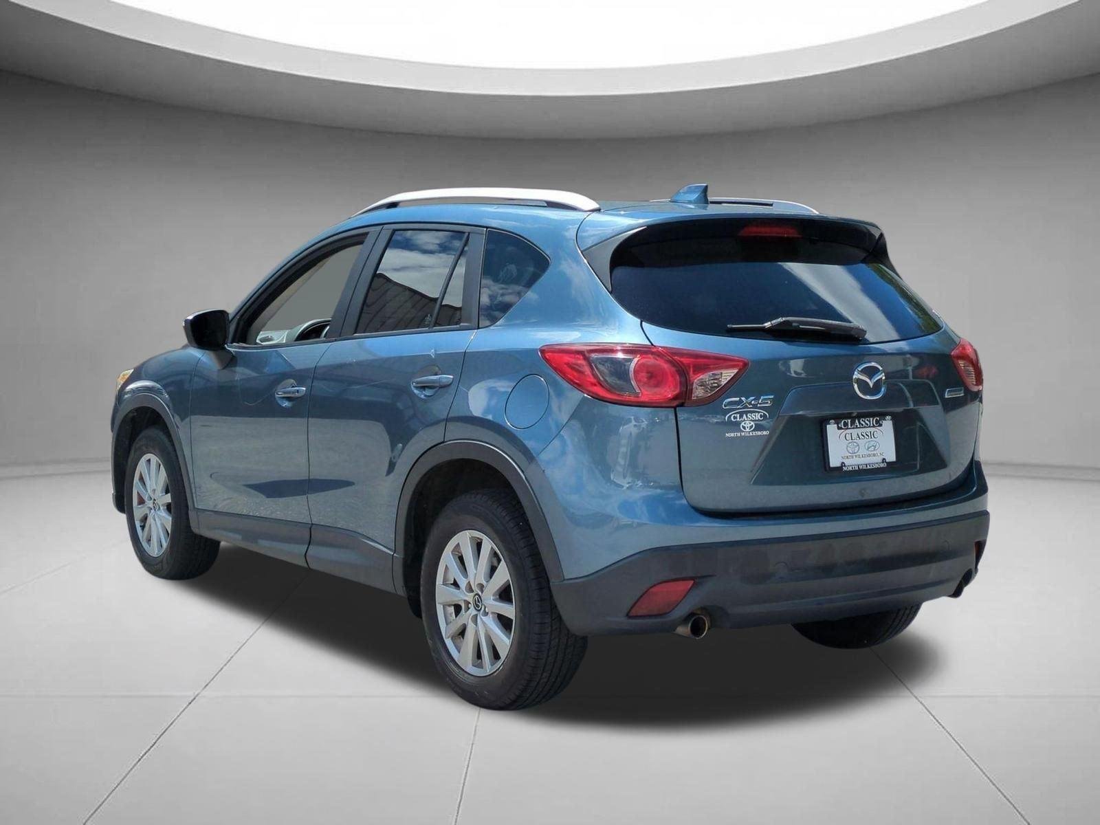 Used 2015 Blue Reflex Mica Mazda Touring image 3