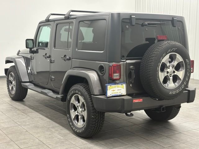 Used 2016 Gray Jeep Unlimited Sahara image 4
